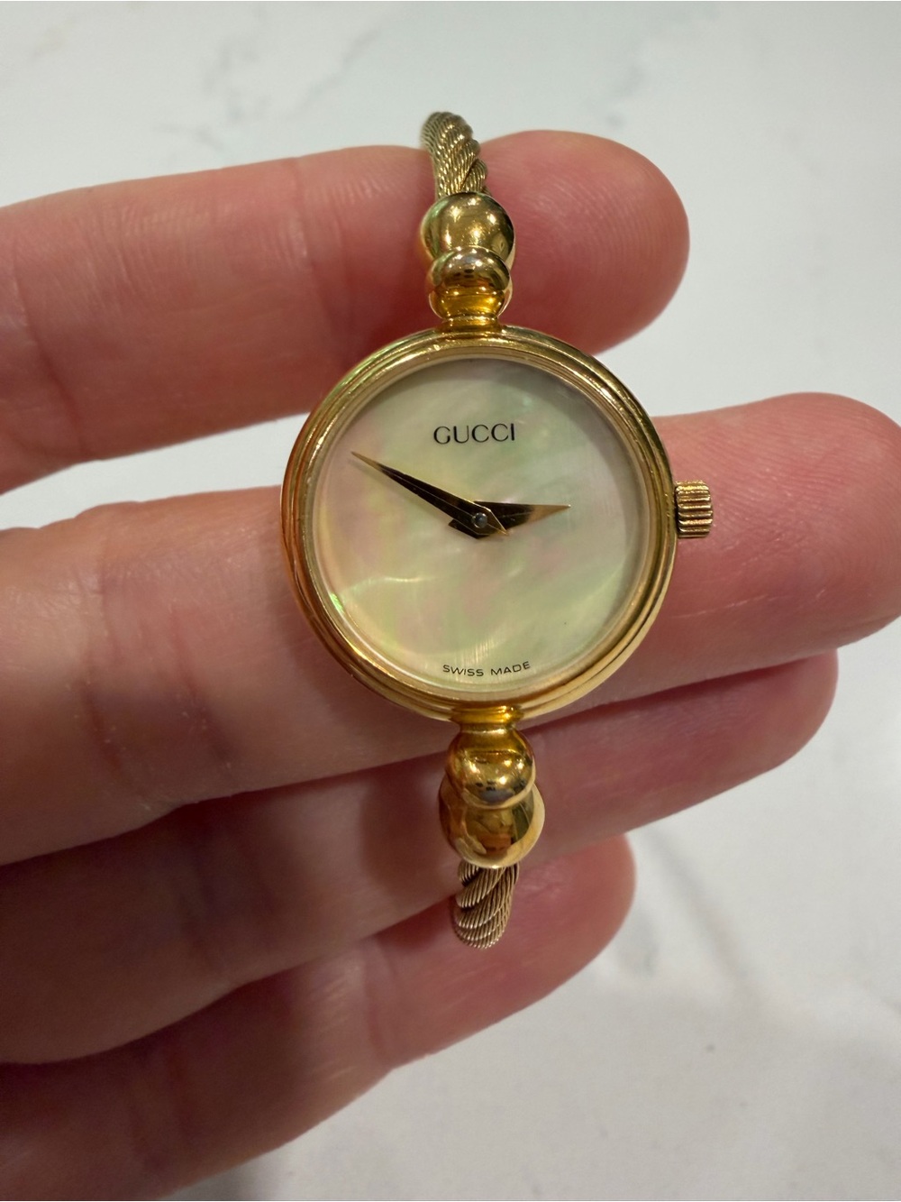 Gucci Gold-Tone Mother-of-Pearl Dial Twisted Bangle Watch - Picture 2 of 4